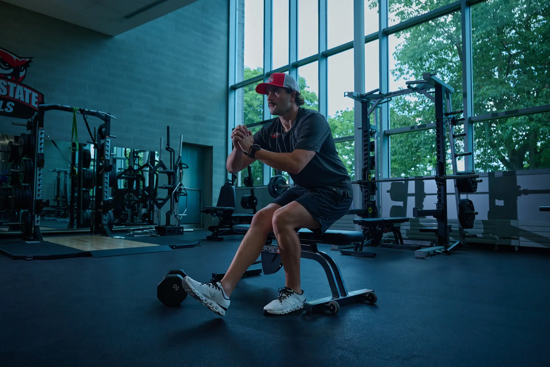 Young man doing physical therapy at a gym
