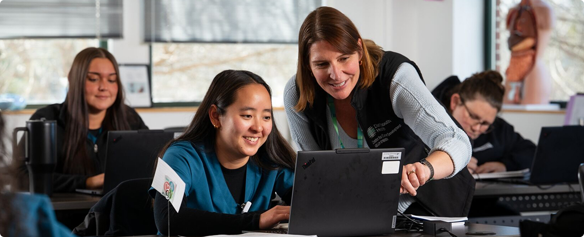 MA and Surgical Tech Programs. Classroom scene at Evergreen : Matt Mackenzie, Lisa Verni, Mei Genest, Abigail Wilkkinson with "teacher" Kelly O'Brien