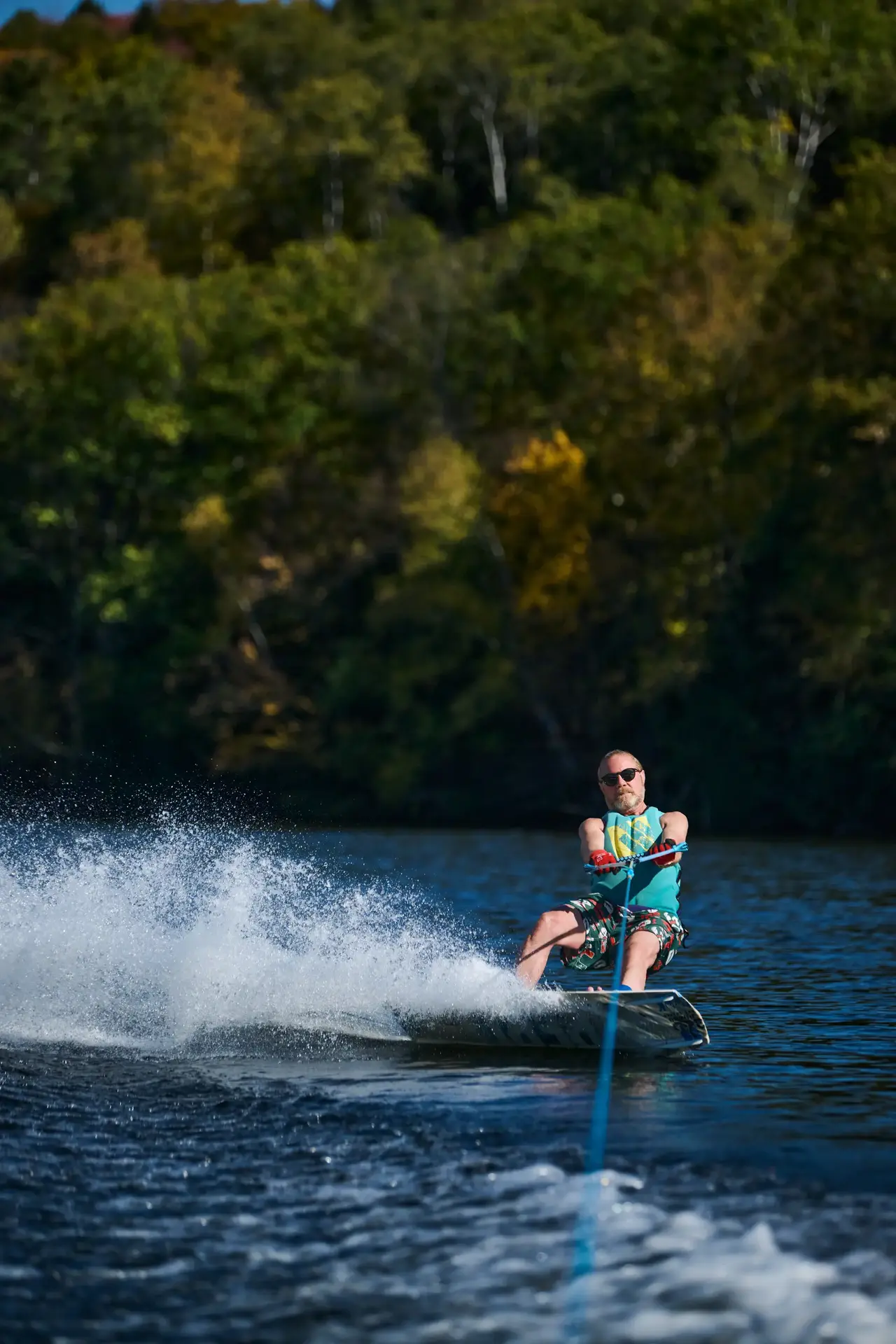 A man water skiing on a lake