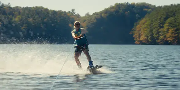 Man waterskiing on a lake