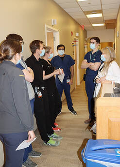 Dermatology Residents in Hallway