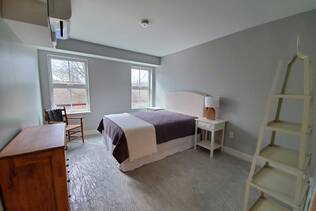 The bedroom in a 195 Mechanic Street apartment