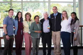 a team of healthcare providers standing in a line