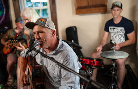 Eric S. Rothstein, MD, on the drums, and Pete Meijer, on guitar, perform together at the Skunk Hollow Tavern in Hartland Four Corners, Vermont.