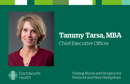 Headshot of Tammy Tarsa on green background