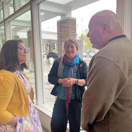 Attendees talking at the 2026 Dartmouth Rural Health Symposium
