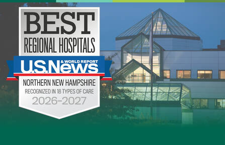 An exterior shot of DHMC with the US News badge