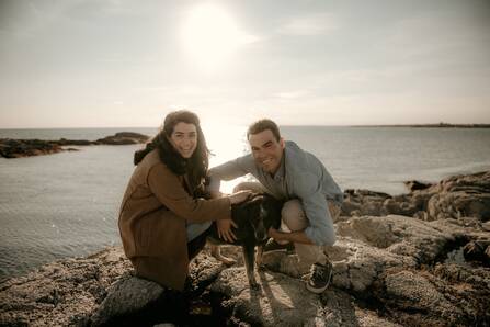 Emily Levine, MD, Ophthalmology resident and her husband visit a lake with their dog.