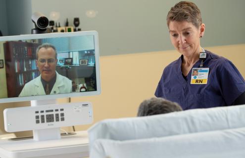 A nurse and a patient participating in a telehealth appointment