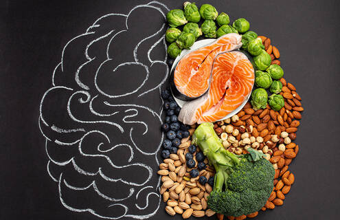 Chalk hand drawn brain with assorted food