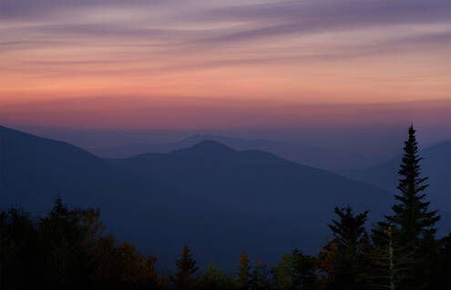 smokey haze over New Hampshire's mountains