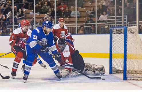 Photo from previous Battle of the Badges showing hockey players on ice