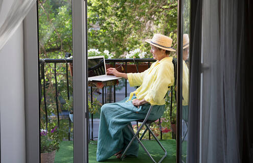 Woman sitting outside in the summer
