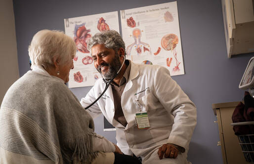 Dartmouth Hitchcock Clinics Manchester Cardiologist Kalyan Ghanta, MD, with a patient