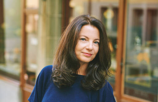 Woman outside on a spring day in a town