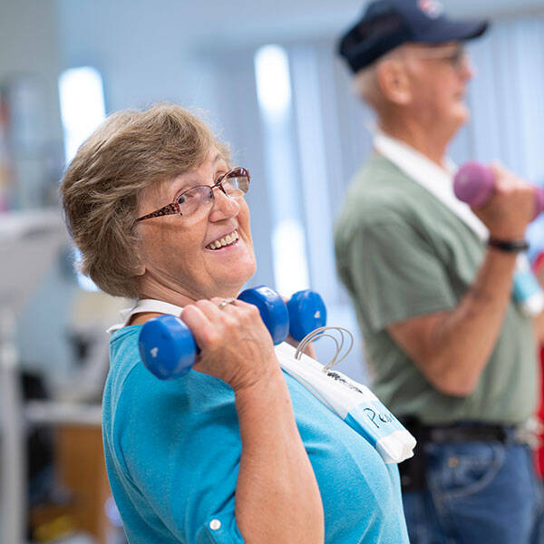 Woman exercising with dumbbells