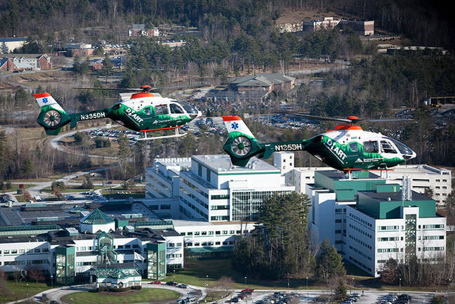 DHART Helicopters flying over Dartmouth Hitchcock Medical Center in Lebanon, NH