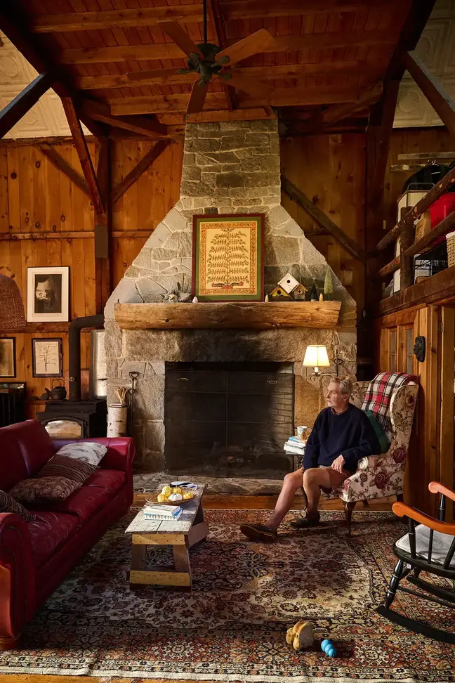 Joe Monninger sitting in his living room