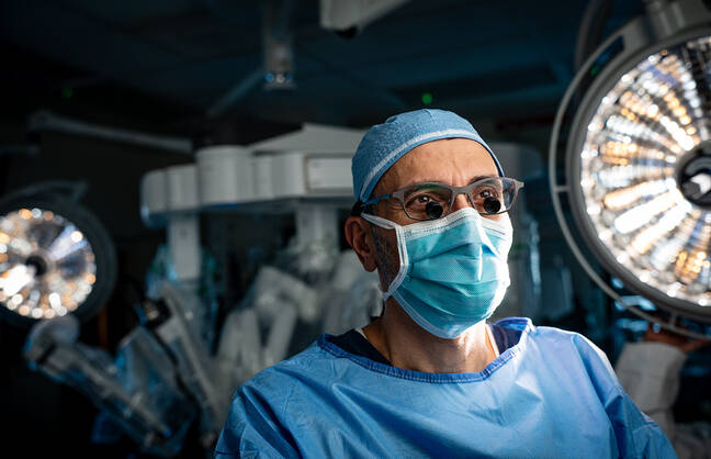 Surgeon looking at a screen