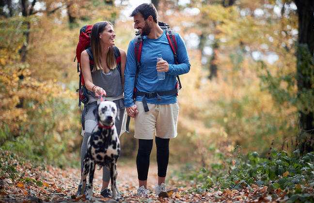 Two people walking outside in spring