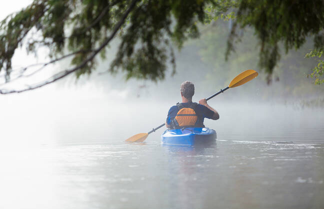 Man kayaking