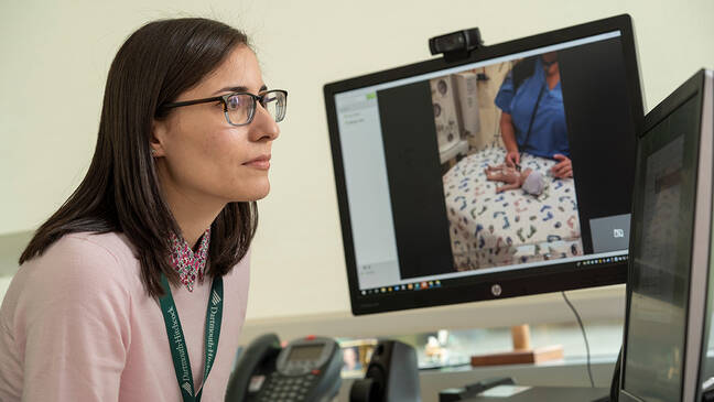 Provider using telemedicine to treat newborn patient