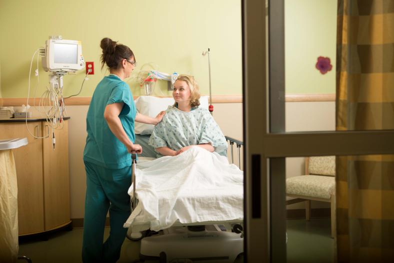 A provider with a patient at Dartmouth Hitchcock Clinic Nashua