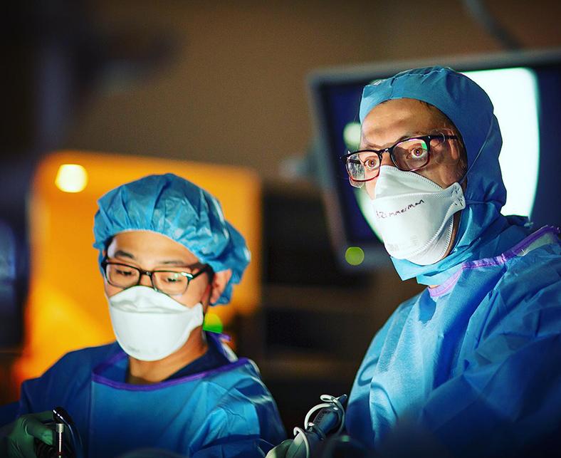 Surgeons in full scrubs in operating room at Dartmouth Health