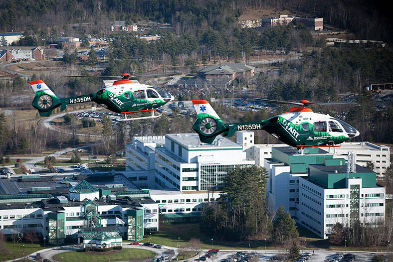 DHART Helicopters flying over Dartmouth Hitchcock Medical Center, Lebanon, NH