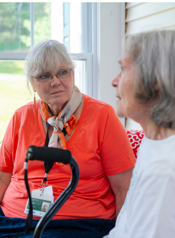 vnh spiritual counselor talking with hospice patient at home