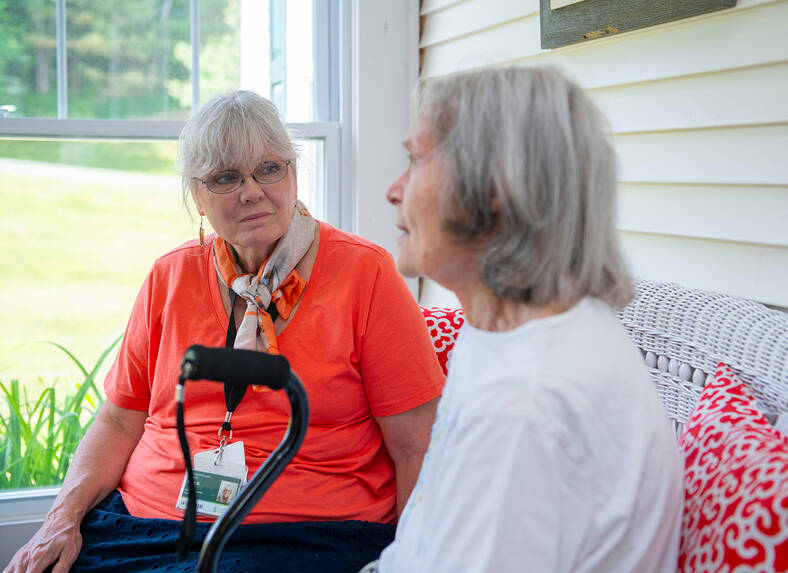 vnh spiritual counselor attentively listening to hospice patient
