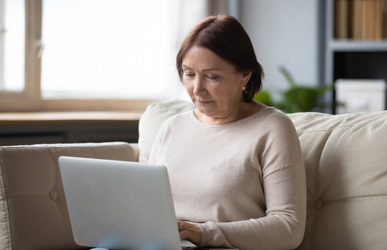 Woman looking at a laptop