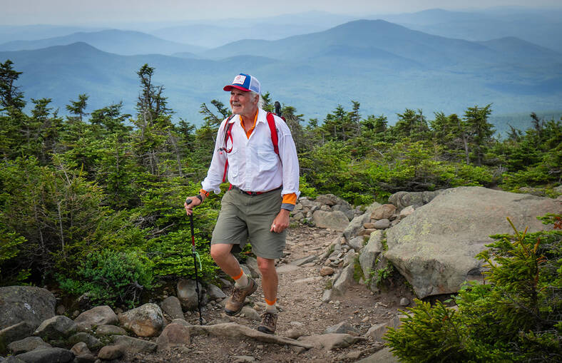 man hiking on mountain