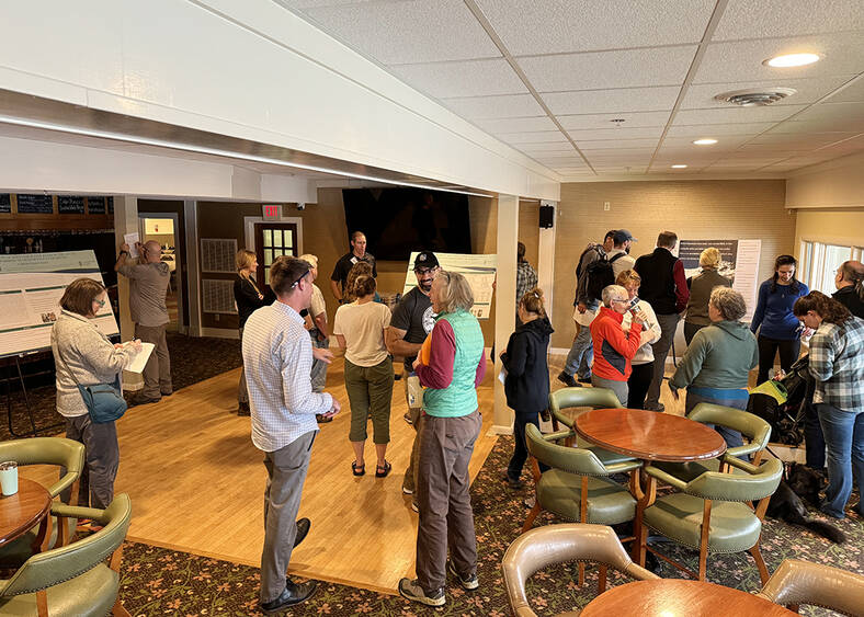 WAM conference attendees in a conference room